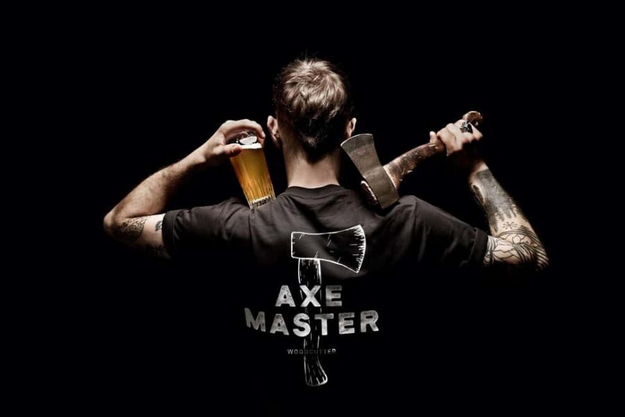 AXE THROWING & ENJOYING DRINKS IN COLOGNE'S FIRST AXE THROWING BAR - WoodCutter Köln: a 1-hour axe session that feels like a real activity