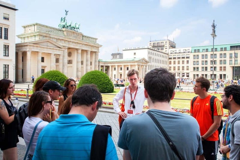 Berlin: History of the Third Reich Guided Walking Tour - Finding your guide by Brandenburg Gate in red