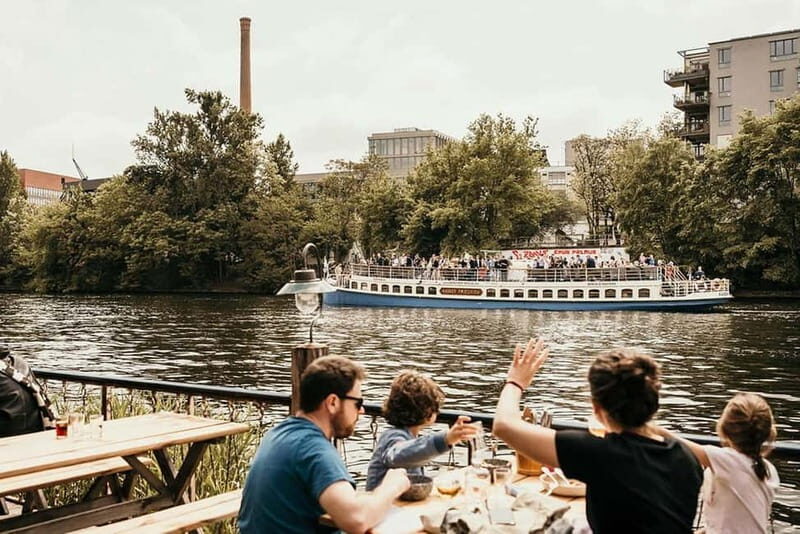 Berlin's Wild East: Nightlife & Counterculture Boat Tour - Entering the East Side Gallery from the waterline