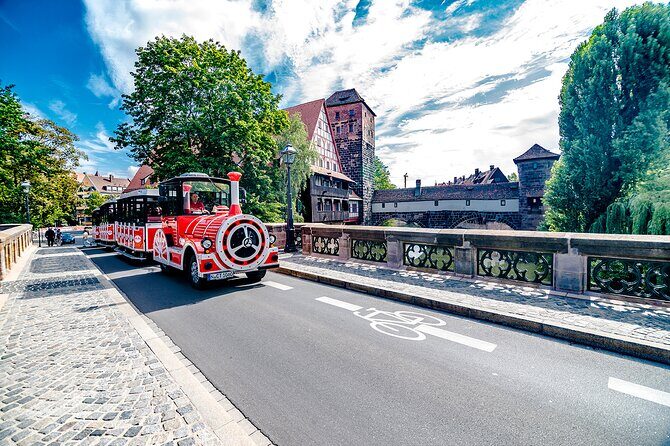 City tour through Nuremberg with the little train - Christmas tour - Riding the little train: seating, headphones, and comfort