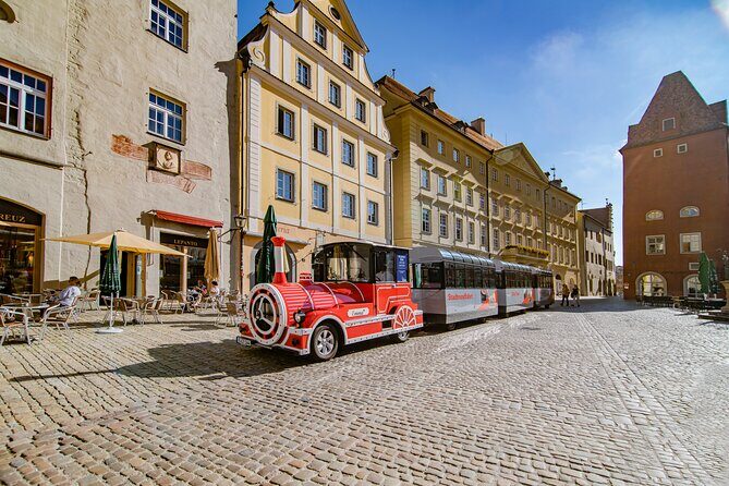 City tour through Regensburg with the little train - Heated, glass-sided cars + headset narration in English