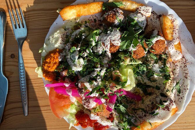 Classic Bites and Culinary Trends Neighborhood Food Tour in Berlin - Schönhauser Allee Street Snack: A Divided-City Flavour Story