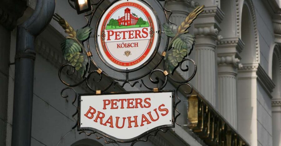 Cologne: 3 Old Town Breweries Guided Walking Tour - Entering Old Town Cologne Through Kölsch