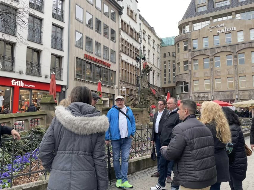 Cologne: 3 Old Town Breweries Guided Walking Tour - Meeting at Heinzelmännchenbrunnen: Find the Guide Fast