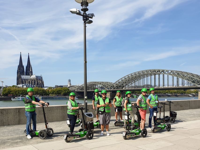 Cologne: Guided E-Scooter Tour - Along the Rhine: Groß St. Martin and Rheinauhafen Views