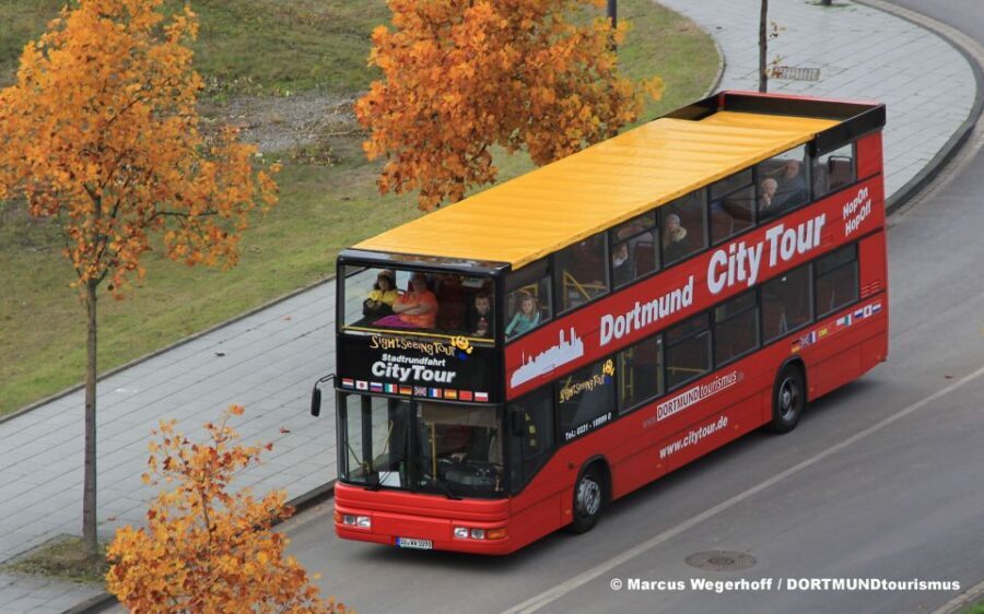 Dortmund: 24-Hour Hop-On Hop-Off Sightseeing Bus Ticket - The open-top ride: views, audio in 11 languages, and seat reality
