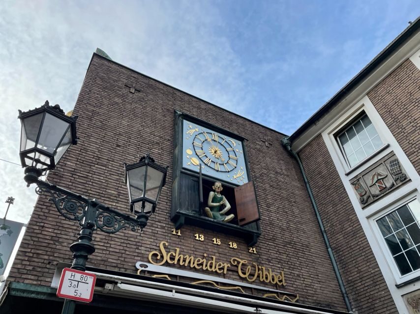 Düsseldorf: Guided Old Town Tour with Beer Break - Starting at Tritonenbrunnen: Getting oriented in Düsseldorf