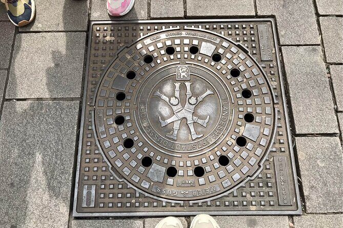 Düsseldorf Walking Tour: Explore Top Sights & Hidden Gems - Konigsallee: Düsseldorf’s Fashion Runway at Street Level