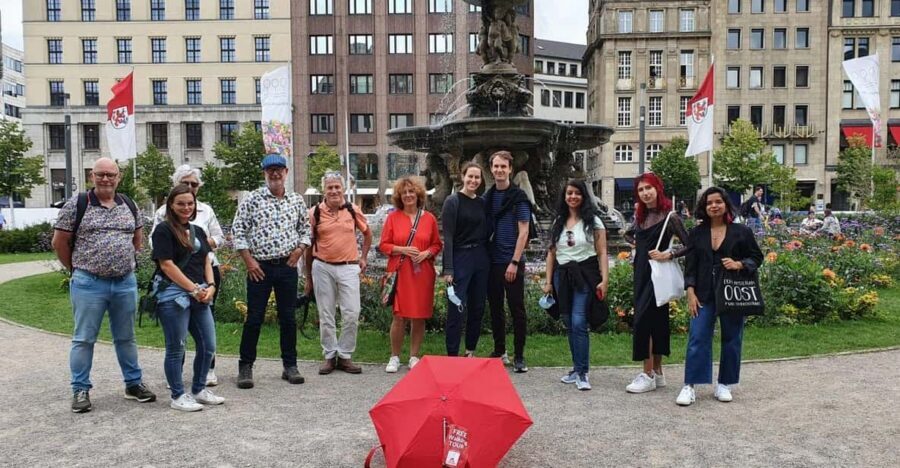Explore Düsseldorf with Passionate tour guides! - Meeting Point at Leonidas: Finding the Red Umbrella