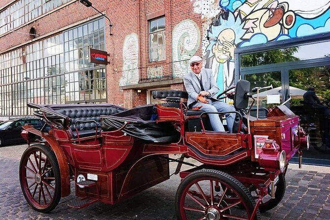 first electrical carriage in town - guided City Tours - Leipzig - Augustusplatz: university views plus the open-book moment