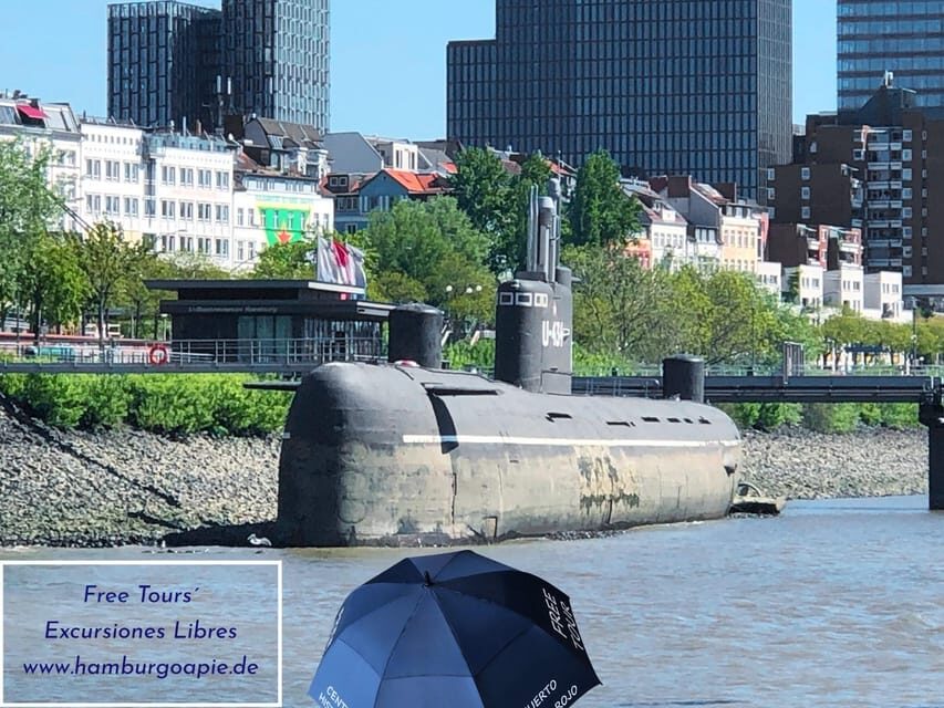 Free Tour: Port, Red Light District and Beatles. You decide how much to pay at the end - Finding the group: Landungsbrücken Brücke 5 and a blue umbrella