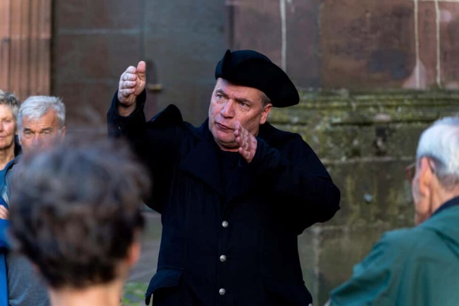 Freiburg: Acting tour "Witches, Torture, Stake" with Historix-Tours - Schiffstraße 14 and Münsterplatz: homes and the danger of being singled out