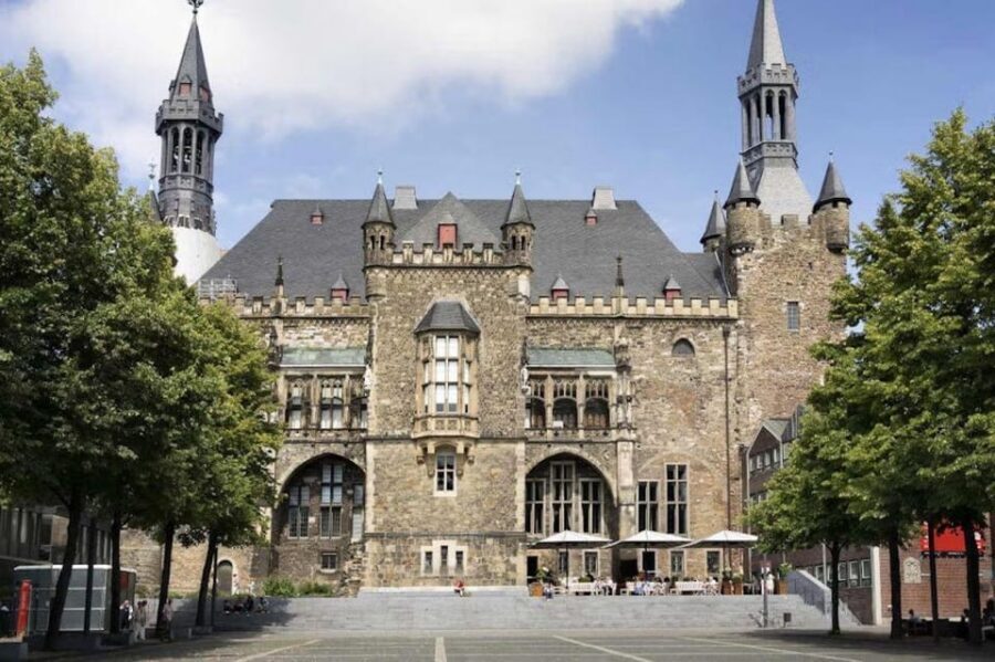 Germany: Guided tour of Aachen - Couven Museum and the doll fountain: quirky landmarks that add color