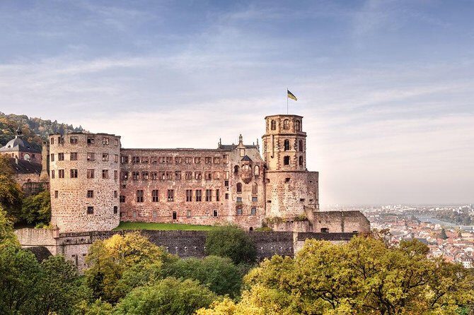 Heidelberg and Rhine Valley Day Trip With Wine Tasting and Dinner from Frankfurt - Old Town between bridges: Karl Theodor Bridge, Holy Spirit Church, and University views