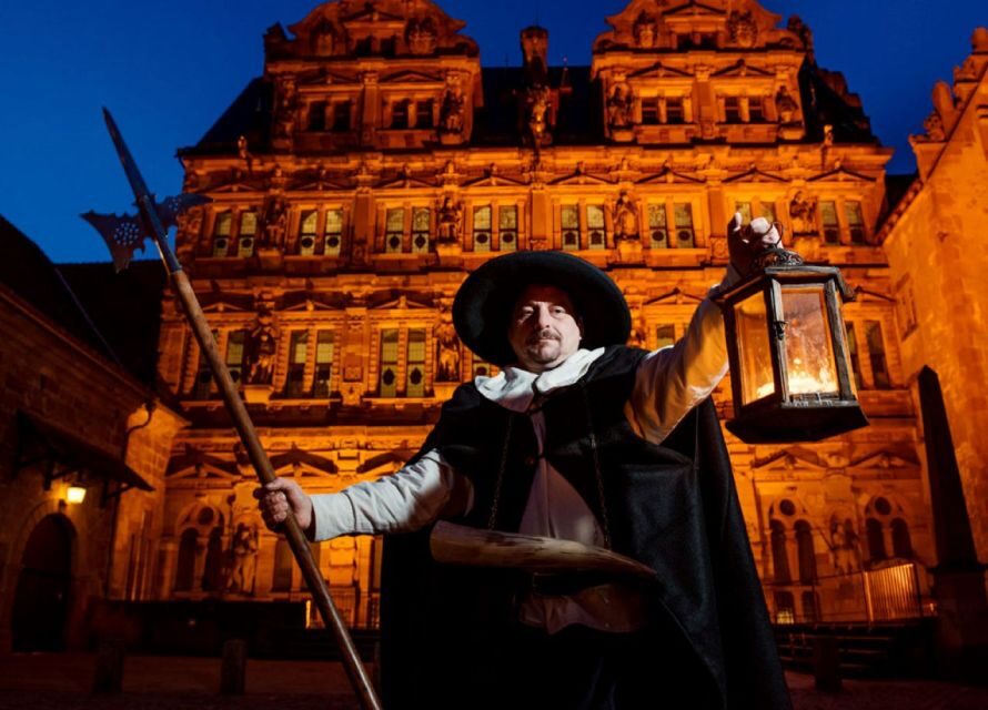 Heidelberg: Torchlight Tour with a Night Watchman - Heading toward Karl Square: castle ruins in torchlight