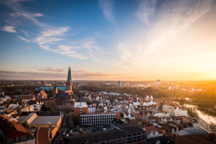 Lübeck: Old Town Highlights Private Walking Tour - Salt warehouses, Rathaus, and the riverfront-to-bridge walk
