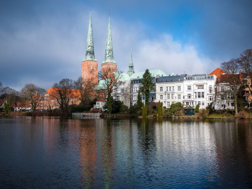 Lübeck: Old Town Highlights Private Walking Tour - Marienkirche and Lübeck Cathedral: clocks, legends, and church interiors