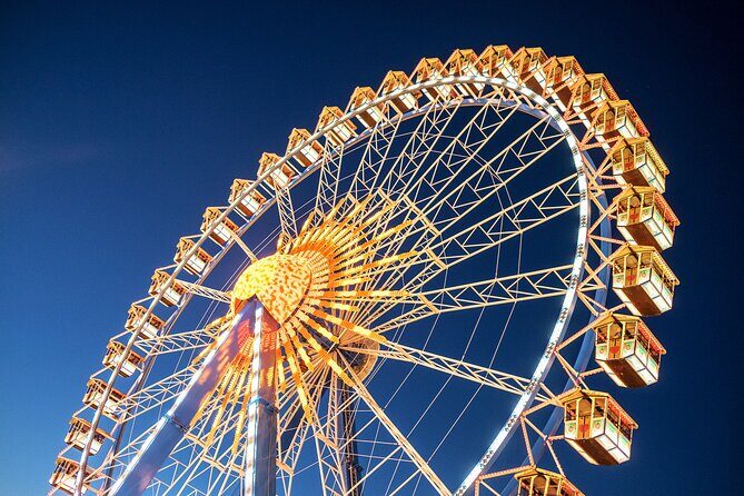 Munich City Walk and Oktoberfest Tour With Beer Tent Reservation - Oktoberfest grounds orientation: learn what you’re looking at