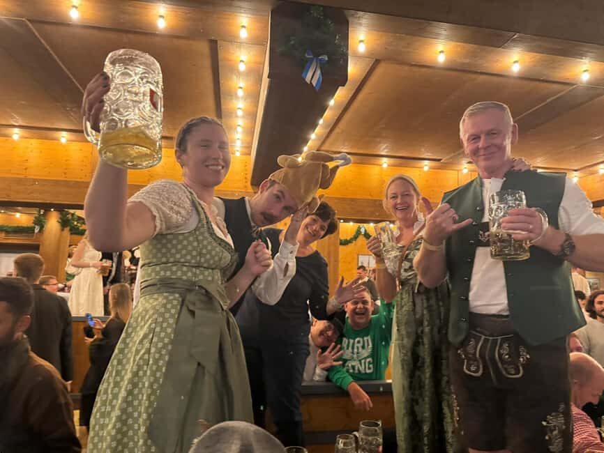 Munich: Oktoberfest Big Beer Tent Evening Table Reservation - Lederhosen & Dirndl rental shop meet-up: your shortcut to sanity