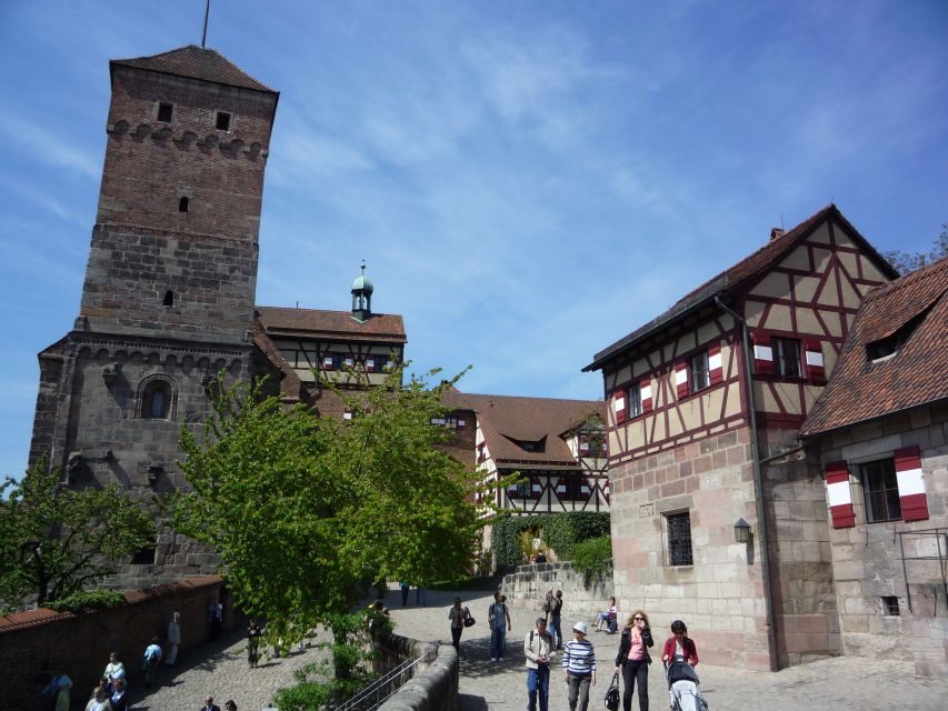 Nuremberg 2-Hour Old Town Highlights Walking Tour in English - Nazi-era sites: Congress Hall, Zeppelin Field, and Luitpold Arena—handled with care