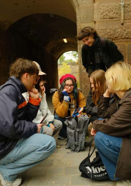 Outdoor escape with puzzle backpack in Nuremberg: The master's legacy - What You’ll Do: 13 Riddles, 6 Locks, and Code Hunting at Six Stops