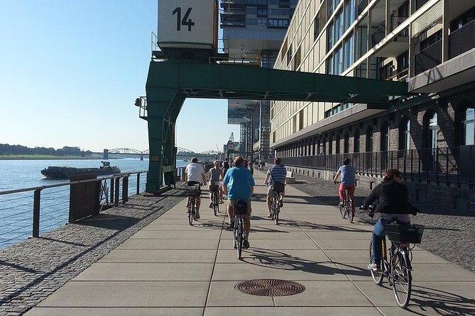 Private-Group Bike Tour of Cologne with Guide - Alter Markt and Salzgasse area: breweries, city hall, and Fish Market