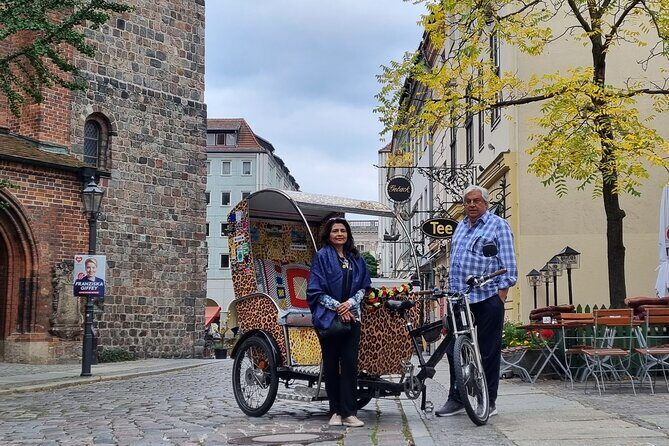 Romantic Berlin Rickshaw City and Photo Tour - incl. pick-up - Checkpoint Charlie, Friedrichstraße, and Gendarmenmarkt: Border History and Elegant Theater Square