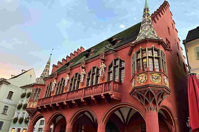 Self Guided Walking Tour through Old Town Freiburg - Merchants’ Hall, St. George fountain, and Freiburg’s trade-to-culture arc