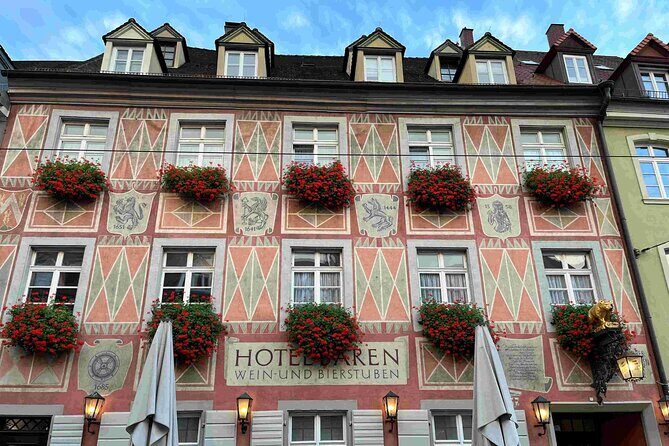 Self Guided Walking Tour through Old Town Freiburg - Medieval gates: Martinstor and Schwabentor in a photo-friendly corridor