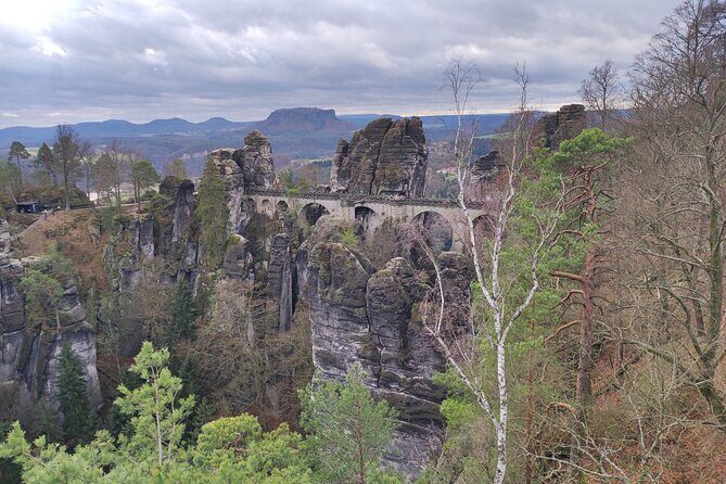 Winterland Tour to Bohemian and Saxon Switzerland from Dresden - Tisá Rocks: narrow passageways, sandstone formations, and winter pacing